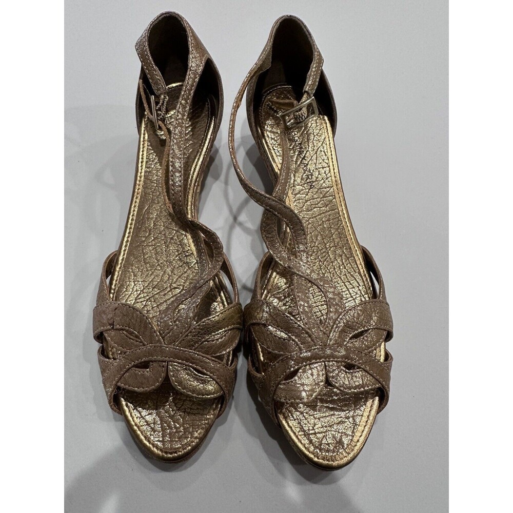 Stylish BCBGMAXAZRIA Gold wedge sandals with ankle strap size 6B